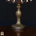 Close-up bronzen kolomvoet Tiffany tafellamp Baroque – sierlijke Art Nouveau kolomvoet met organische blad- en lijnmotieven