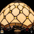 Close-up lampenkap Tiffany tafellamp Rosa Zaffiro – gouden juwelen en crème glas in diamantvorm