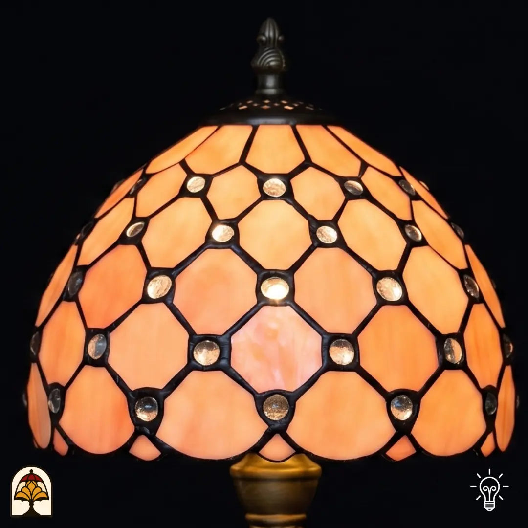 Gros plan abat-jour Nuvola Rosa – verre rose saumon avec cabochons en verre ronds en résille losangée